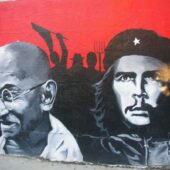 Ghandi and Guevara painted as graffiti on a wall
