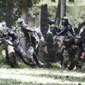 Paint ball players in action.